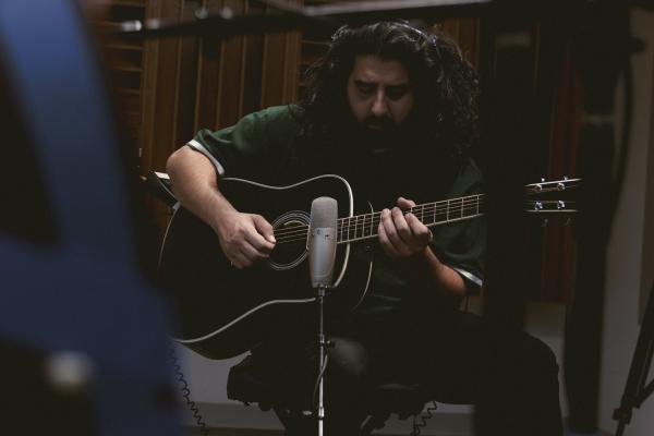 ANDY ANAYA FROM POOL KIDS PLAYING GUITAR